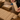 Private-label wooden cutlery sets in kraft paper sleeves with sealed foreground packaging