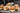 Paper takeaway food boxes displayed at restaurant counter